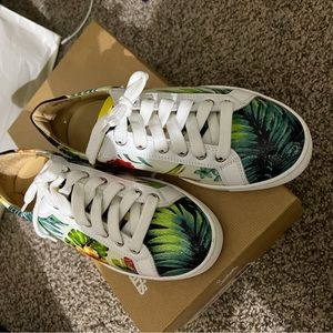 gently used pair of Christian Louboutin gym shoes